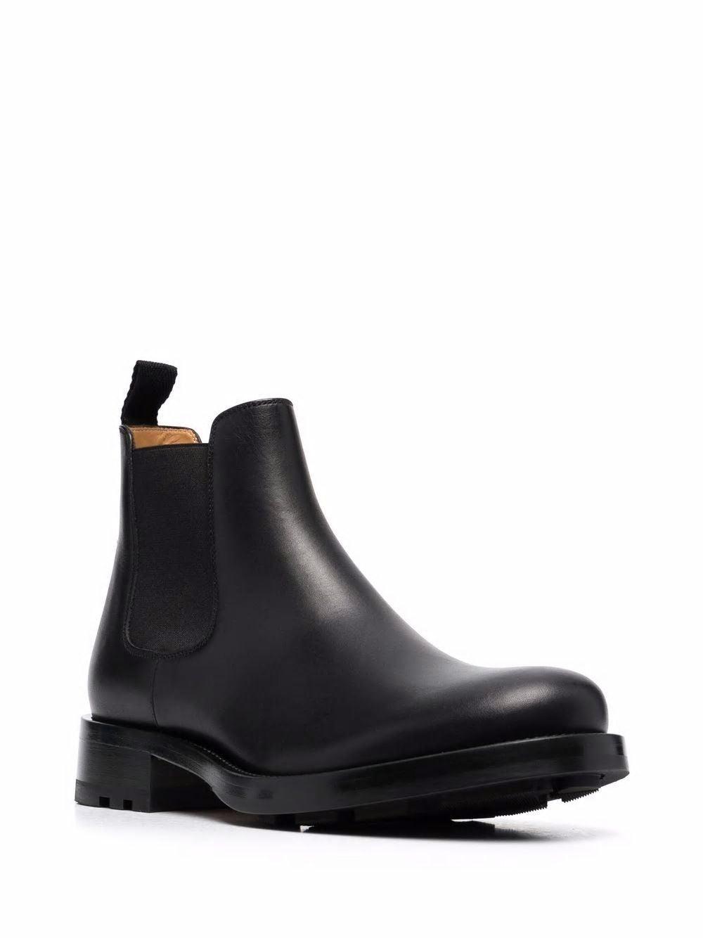 Valentino Garavani Men's Roman Stud Ankle Boots in Nero/Nero
