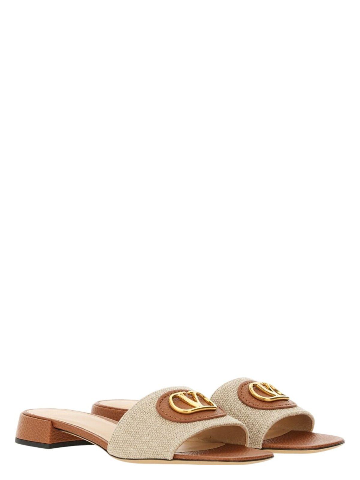 Valentino Garavani Women's Slide Sandal Vlogo Signature in Beige