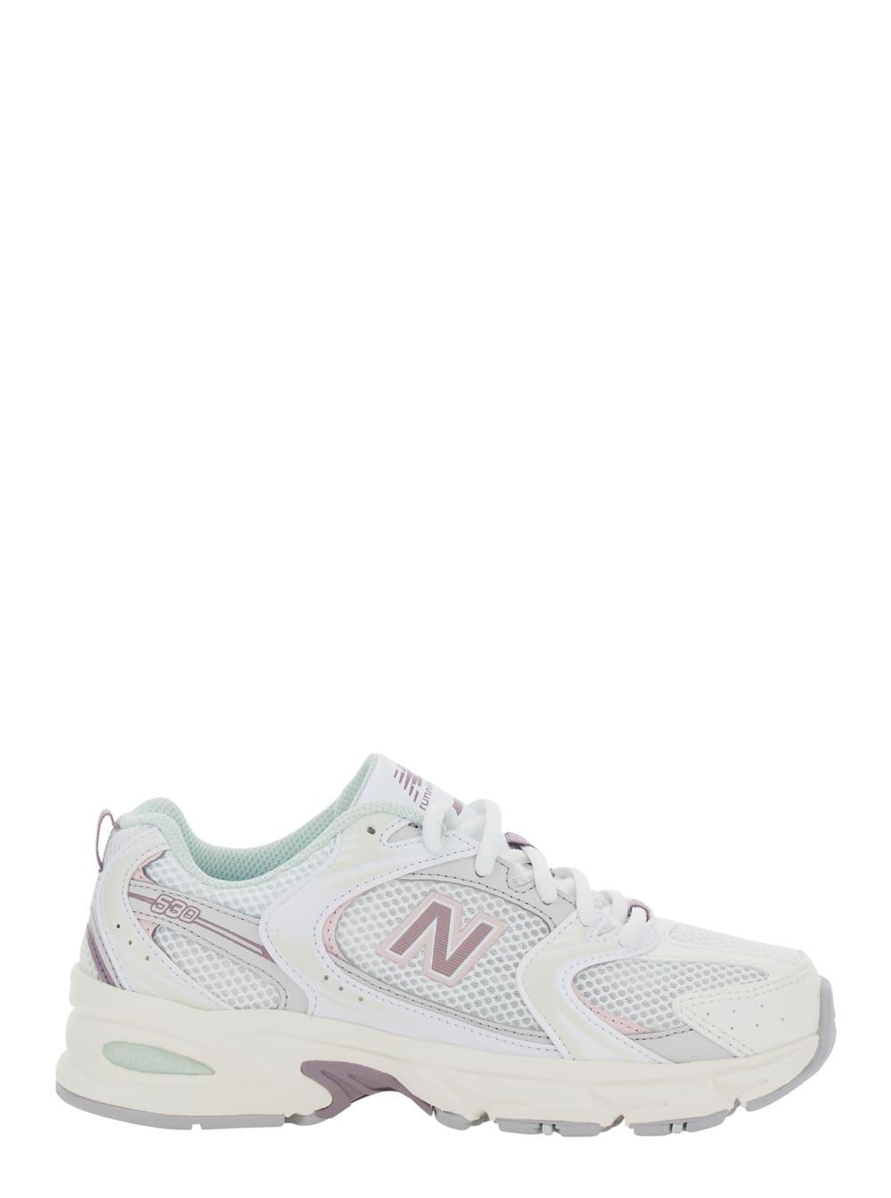 New Balance 530 White Sneaker with Mesh Design and Side Logo