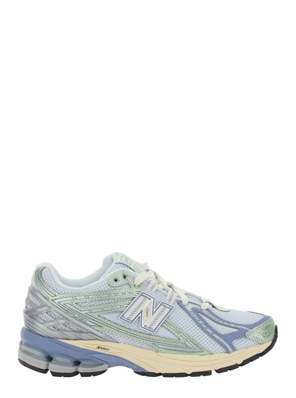 New Balance Blue Low Top Sneaker with Logo Patch and Perforated Panels in Tech Fabric