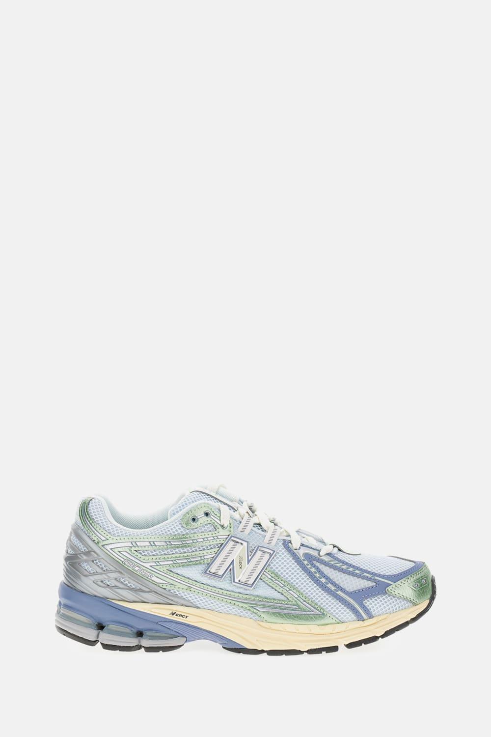 New Balance Blue Low Top Sneaker with Logo Patch and Perforated Panels in Tech Fabric