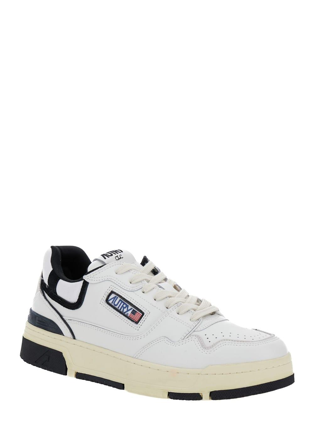 Autry White Low Top Sneakers with Black Details and Logo Patch in Leather and Suede